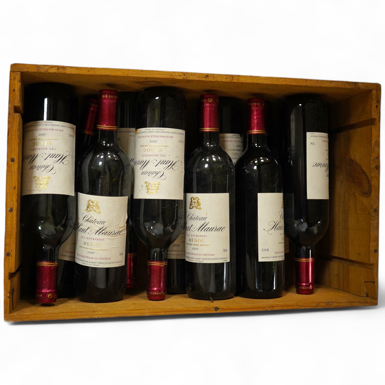 A case of twelve Chateau Haut-Maurac Medoc red wine, 1996. Condition - unknown storage